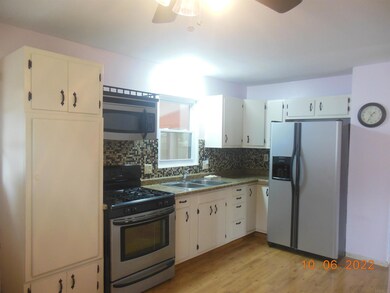 Kitchen to E window overlooking back yard