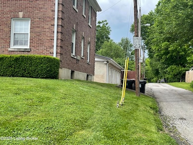 Alleyway To Garage