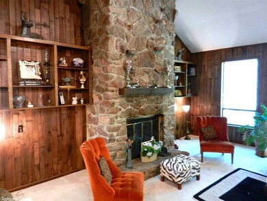 Built-ins flank both sides of Stone to Ceiling FP