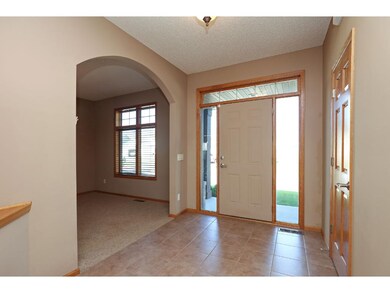 Gracious Entry Foyer with Sidelight & Transom Wind