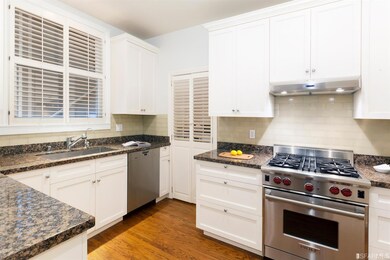 Kitchen showing the Wolf rnge, Miele Dishwasher an