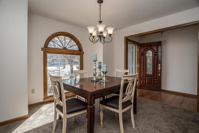 New carpet, fresh paint in formal dining room.