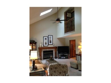 Vaulted ceiling, skylights and balcony in formal l
