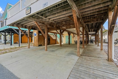 Exterior space featuring a carport