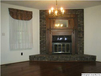 Den with Stone Fireplace