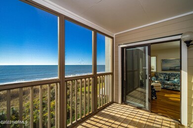 Covered porch overlooking beach