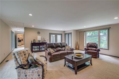 Nice living room area off kitchen, french doors to patio and deck