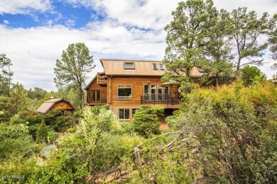 Log home with metal roof