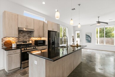 Gourmet island kitchen with stainless steel applia