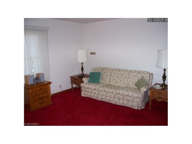 The living room is spacious offer a lot of seating