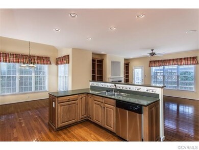 kitchen opens to breakfast nook and family room