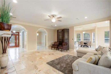 Designer Travertine floors throughout, Den has ope