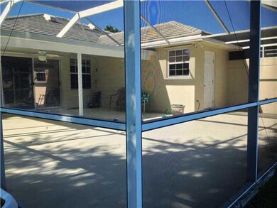 Exterior Back. patio overlooking lake