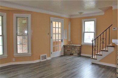 Spacious Living Room just painted. Laminate floor 