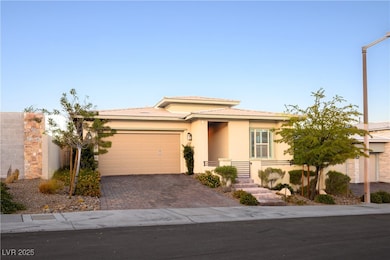 Prairie-style house featuring stucco siding, driveway, a garage, and a tiled roof