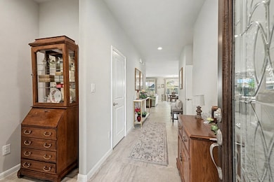Step into this beautiful entryway that welcomes you into your warm and inviting new home.