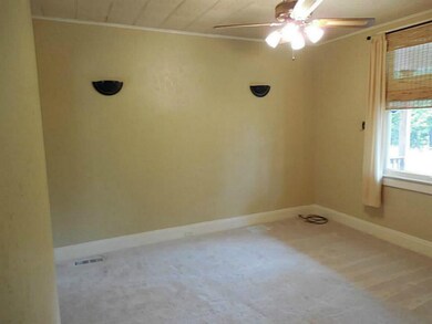 Living Room. Neutral living area for gatherings.