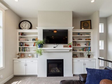 Great room focal point cabinetry and gas fireplace