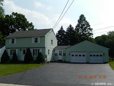 Exterior Front. 2,150 SF vinyl-sided Colonial with