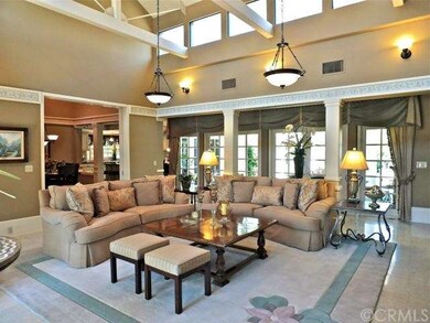 Living room with view of dining room and kitchen