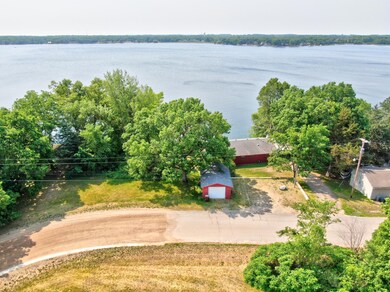 There were two lots conjoined into one creating a .63 acre, 153' of lakeshore single lot.