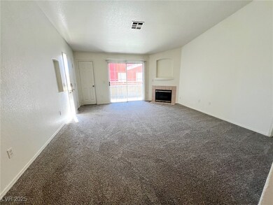 Unfurnished living room with carpet, visible vents