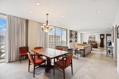 Dining area featuring recessed lighting, a chande