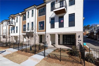 Painted white brick exterior with natural brick on first floor/ covered terrace