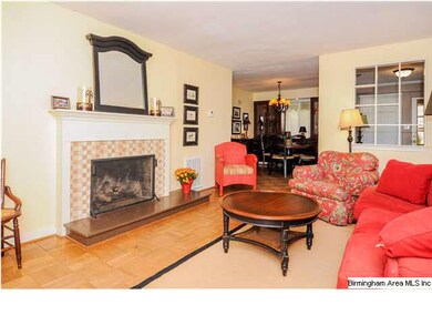 There is a fireplace with gas logs in the living r