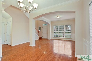 Formal dining and living rooms.