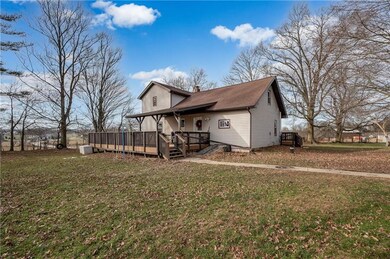 Back of the home with peaceful views