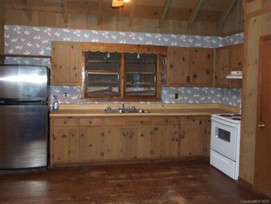 Almost new appliances and wide pine boards