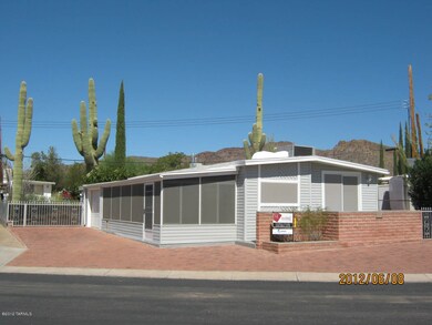 Front shot showing side yard & gate