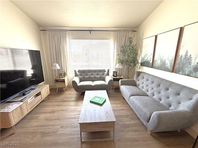Living area featuring wood finished floors