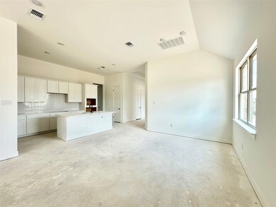 Unfurnished living room with unfinished concrete 