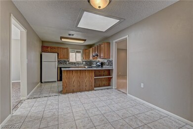 Dining & Kitchen with skylight.