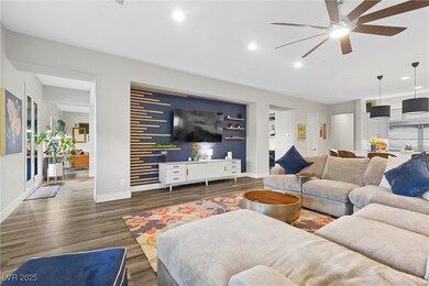 Large great room with custom feature wall.