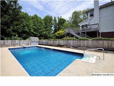 Splish!  Splash!  Gleaming in-ground pool!