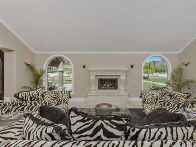 Living room is graced by two new windows which wer