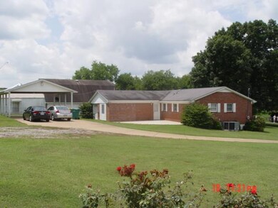 View from the concrete pad located at the backside of this large lot. The pad is already in place and ready for a storage shed or gazebo.