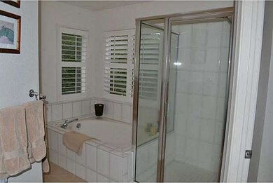 Masterbath Has Roman Tub, Shower and double sinks