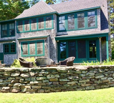 Exterior back of home. Doors from...