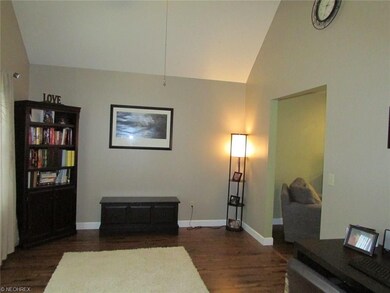 The front living room has vaulted ceilings. This f