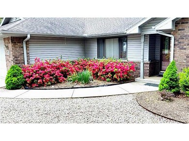 Exterior Front. Azaleas