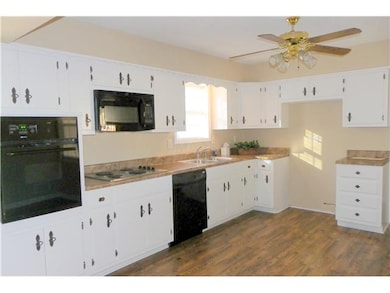 New tops,sinks,oven,floor.
