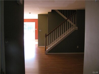 Looking from Foyer to sliders onto the deck