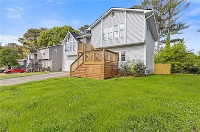 New maintenance free siding, new roof and new sod with a large 2 car garage
