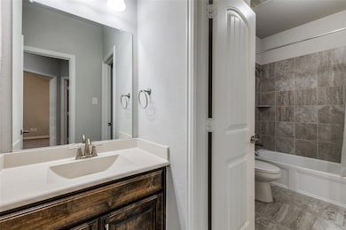Full bathroom featuring vanity and bathing tub / shower combination