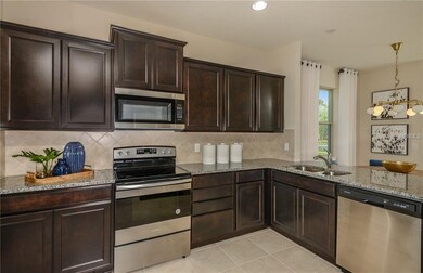 Kitchen - Under construction - photo shown of similar floor plan. Pictures are for illustration purposes only. Elevations, colors and options may vary.