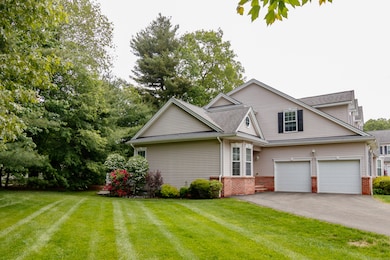 Large side yard with beautiful flowering bushes for your enjoyment